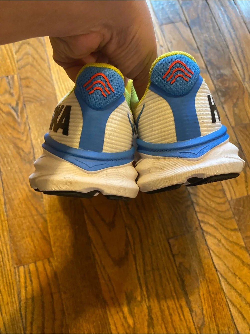 Hoka White Athletic Shoes with Blue Gradient and Neon Yellow Laces